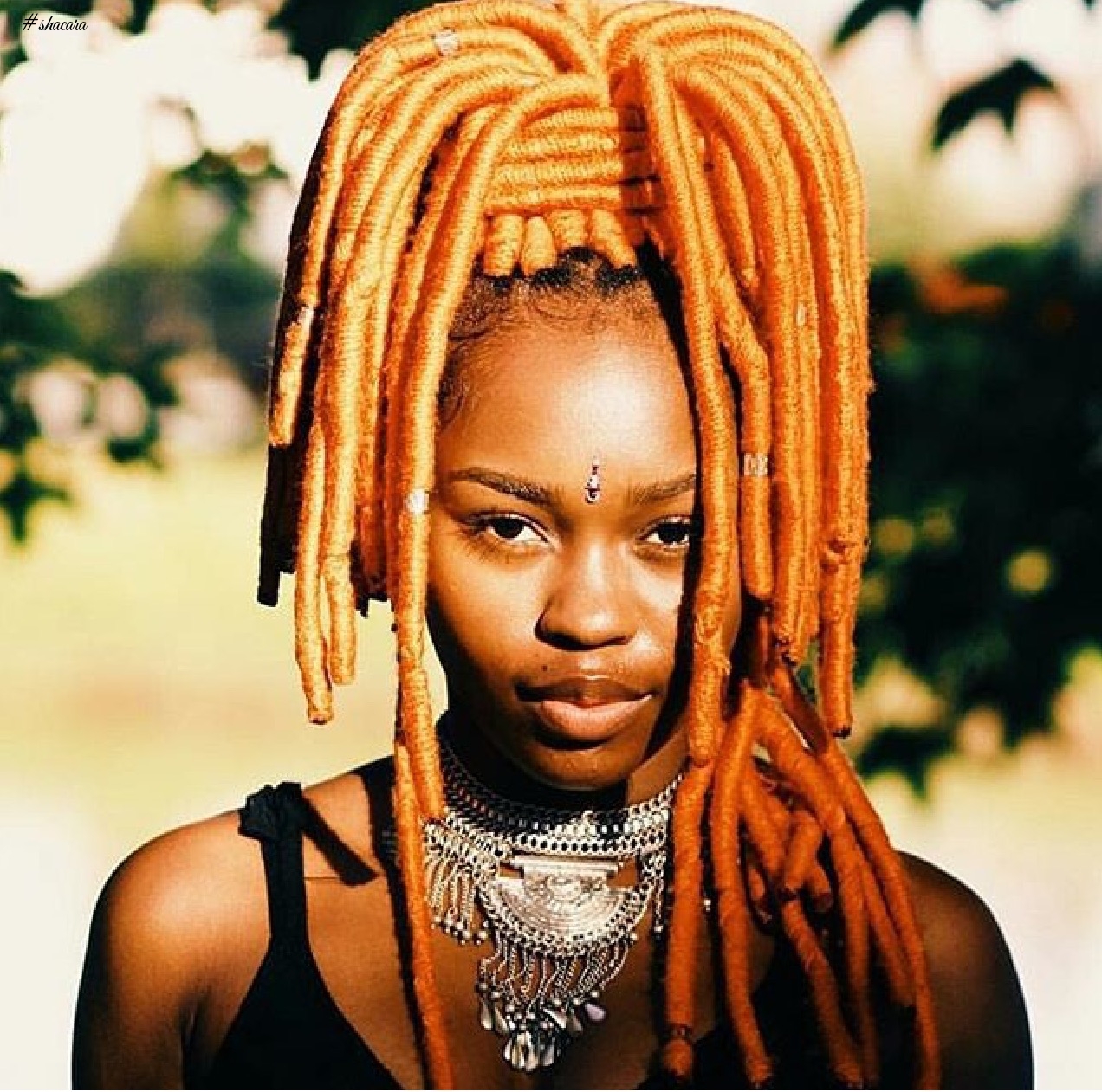 Funky Coloured Faux Locs Styles For Those Who Like To Play Around With Colours