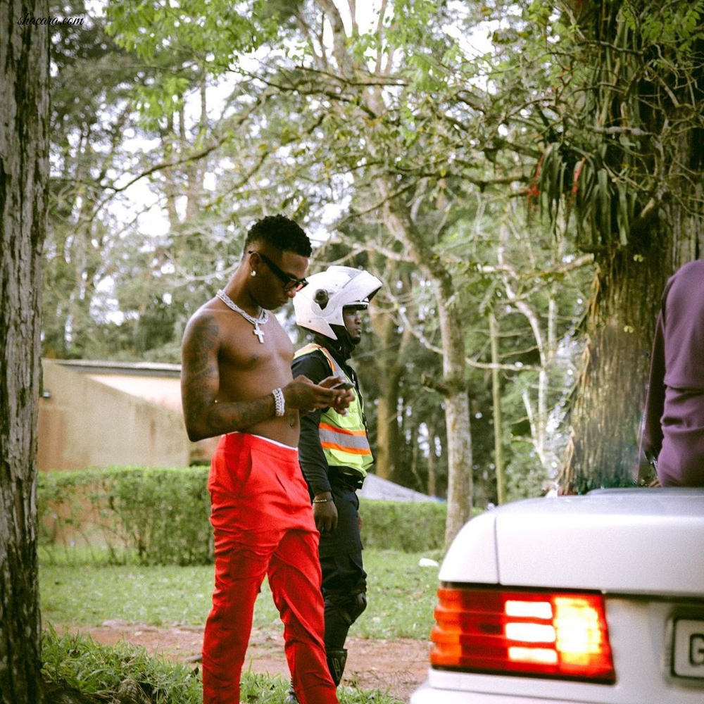 Singer WizKid Dons an Extravagant All Red Relaxed Ensemble