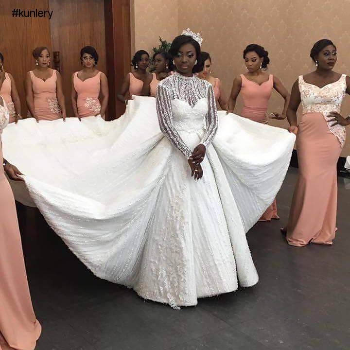 TOP DESIGNER KUNBI OYELESE OF APRIL BY KUNBI AND LANRE TOMORI’S WEDDING