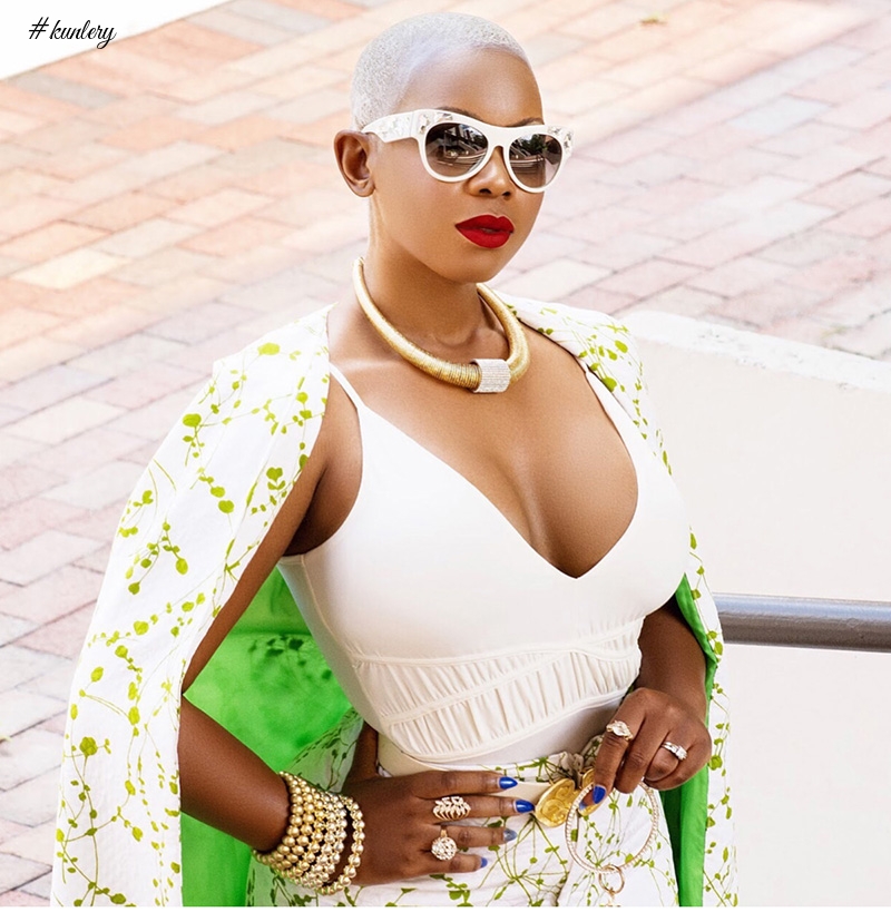 Liberian Traveler & Blogger Sarle Amah Stuns In This Juicy Cape Dress